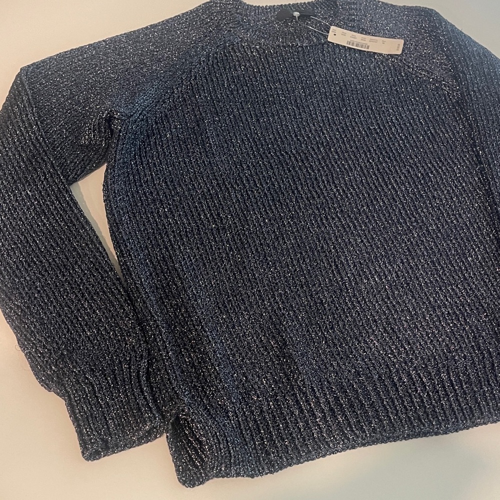 Woman’s Blue Sweater